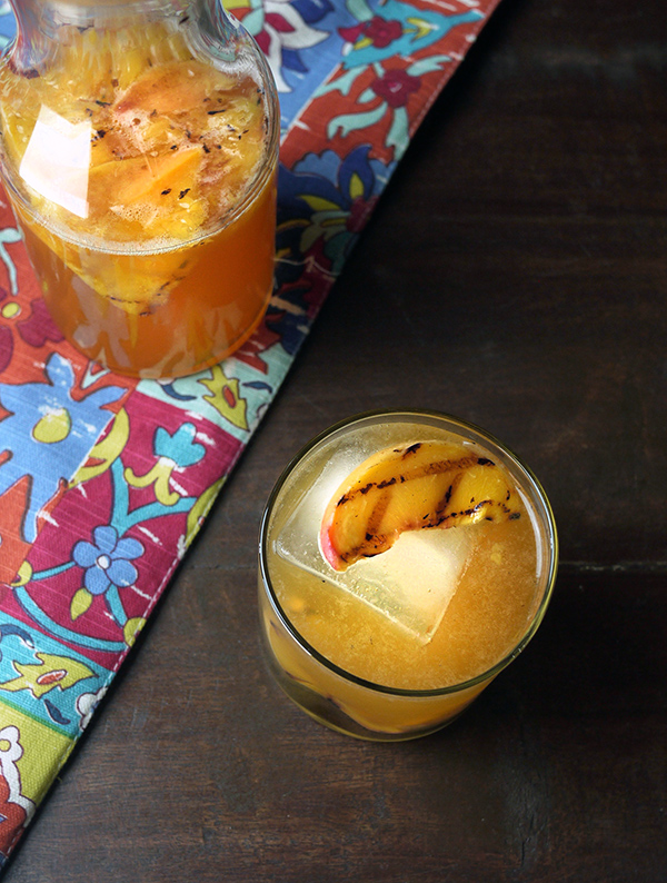 Sparkling Caramelized Peach Rum Punch // stirandstrain.com
