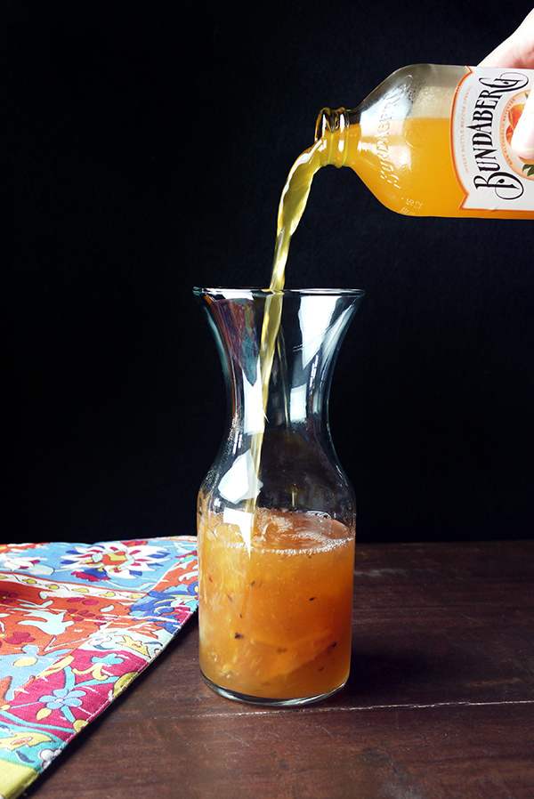 Sparkling Caramelized Peach Rum Punch // stirandstrain.com