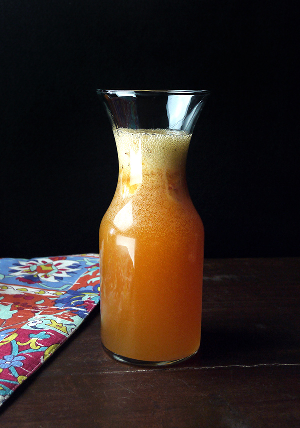 Sparkling Caramelized Peach Rum Punch // stirandstrain.com
